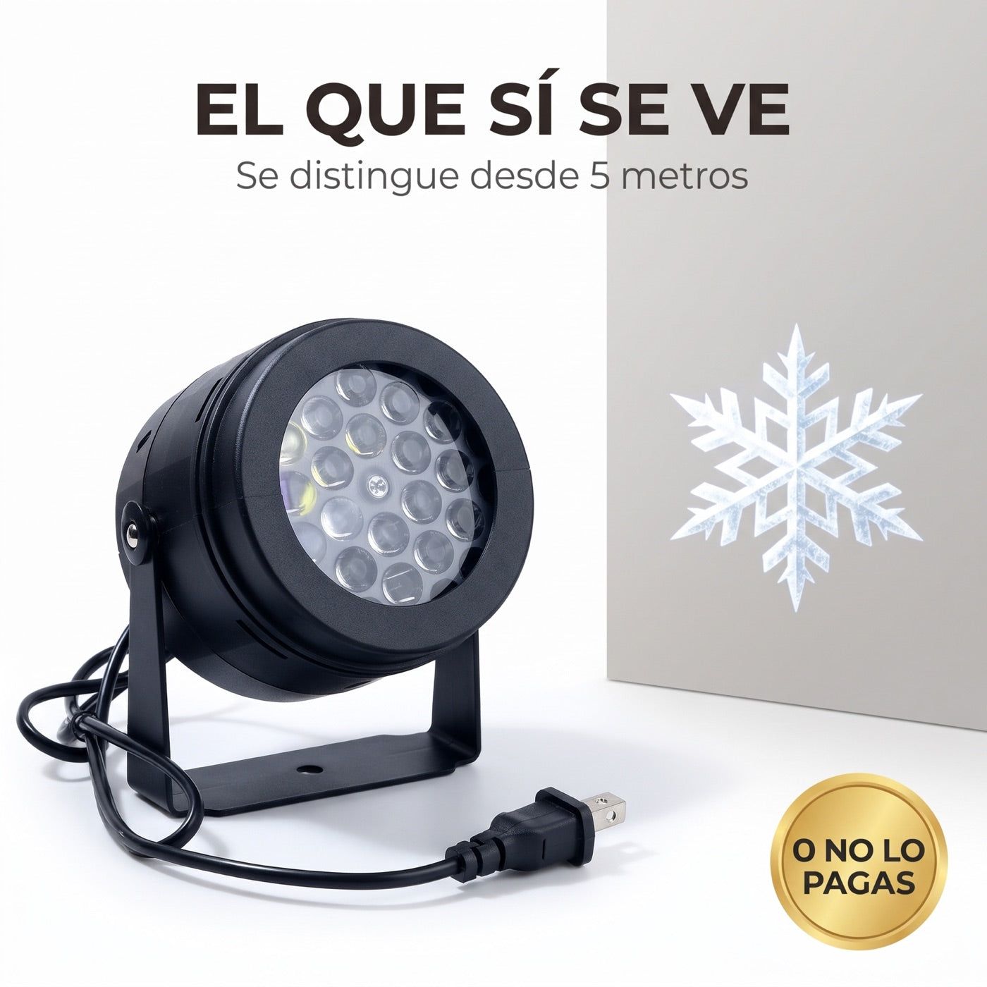 Proyector navideño EL QUE SÍ SE VE proyectando un copo de nieve nítido sobre la fachada